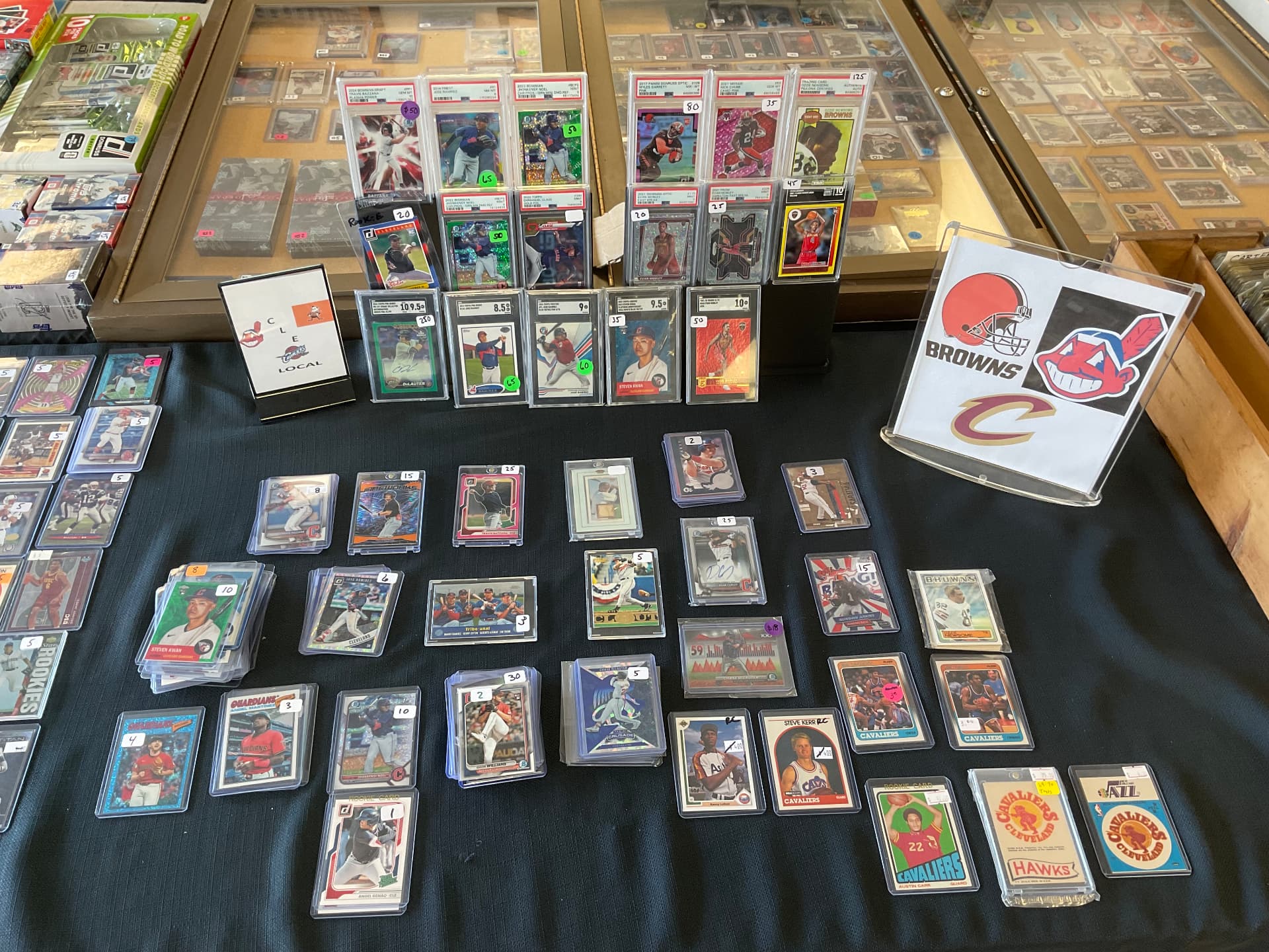 Cleveland local table with Browns, Guardians and Cavaliers cards