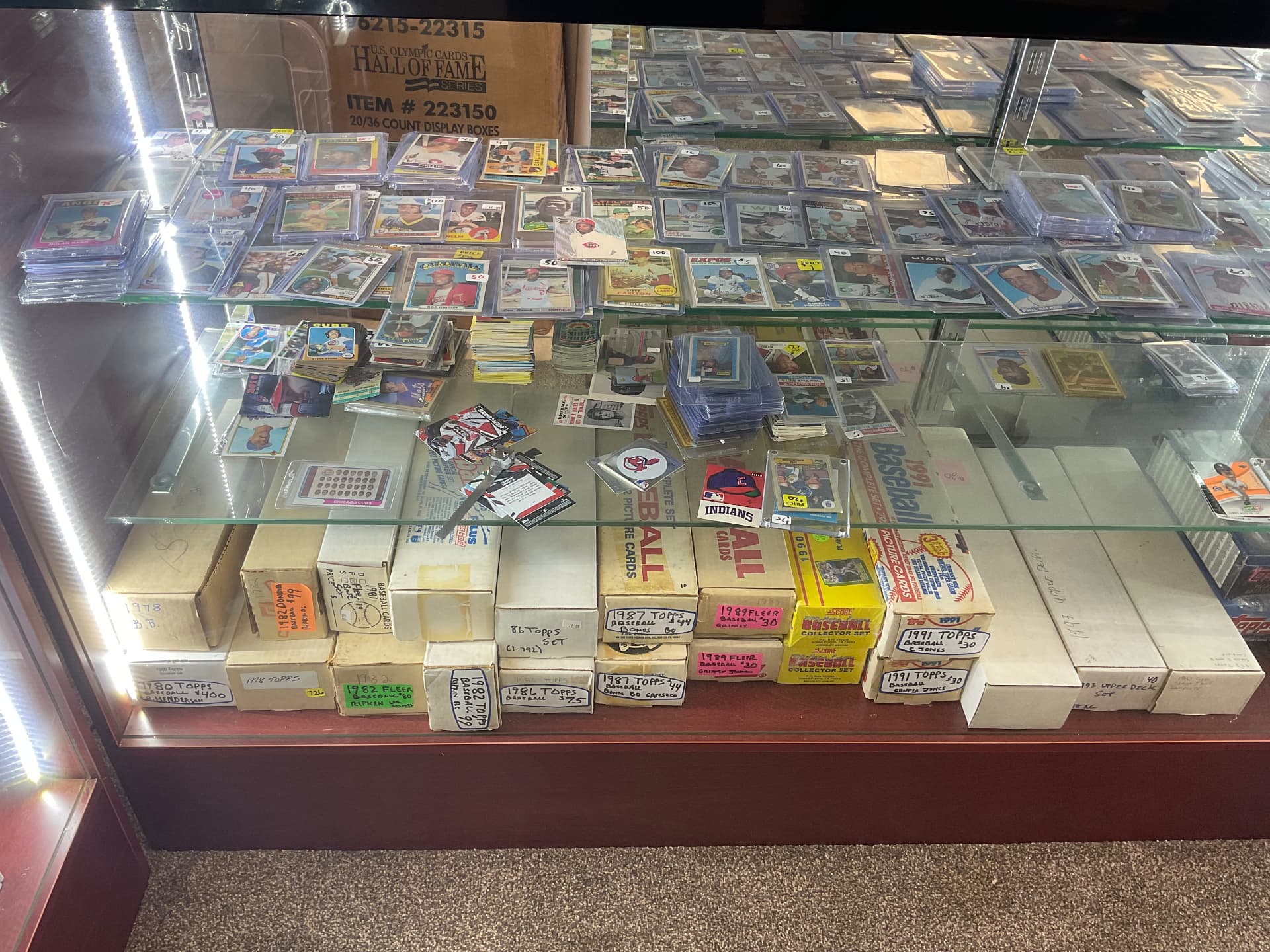Case of vintage baseball singles and complete factory sets